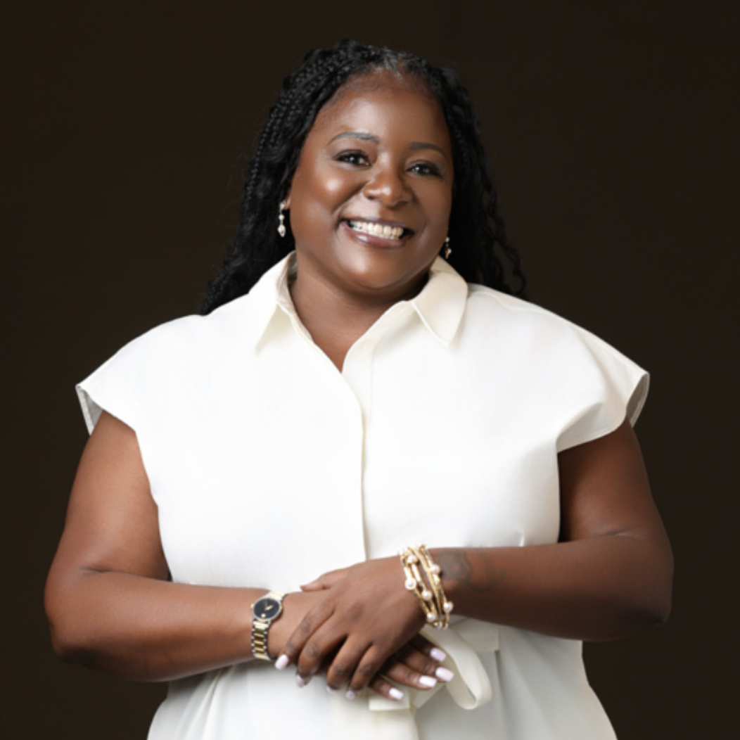 Deanna Bredell, Principal of Kenderton Elementary School, smiling for a professional portrait.